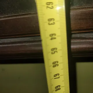 Reloj de pared madera oscuro y dorado