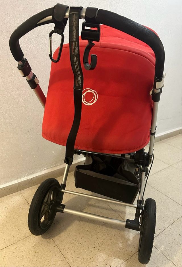 Silla de paseo Bugaboo roja / negra.Y complementos