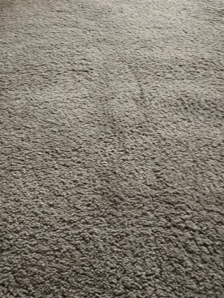 Alfombra gris poliéster