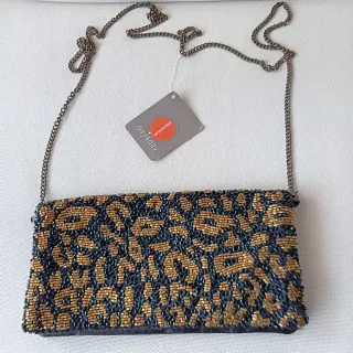 Bolso fiesta Dayaday negro y dorado