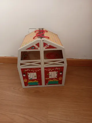 Casa de muñecas de madera