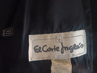Chaqueta cruzada negra vintage.