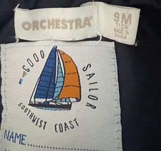 Cazadora bebé azul y mostaza