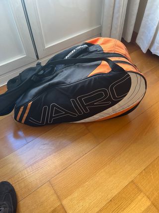 Bolsa pádel, 2 raquetas y botes de pelotas