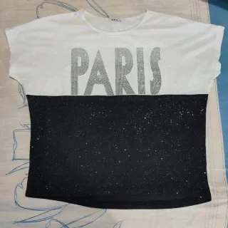 Blusa con brillos y manga dolman