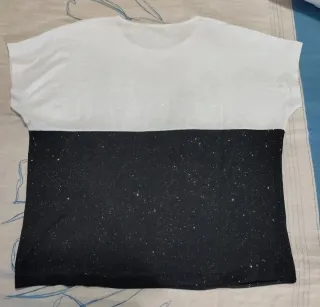 Blusa con brillos y manga dolman