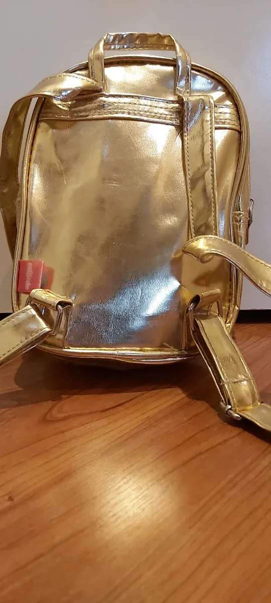 Niña. Mochila y diademas para niña