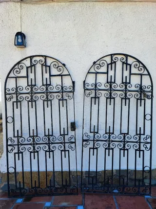 Puerta doble hierro forjado