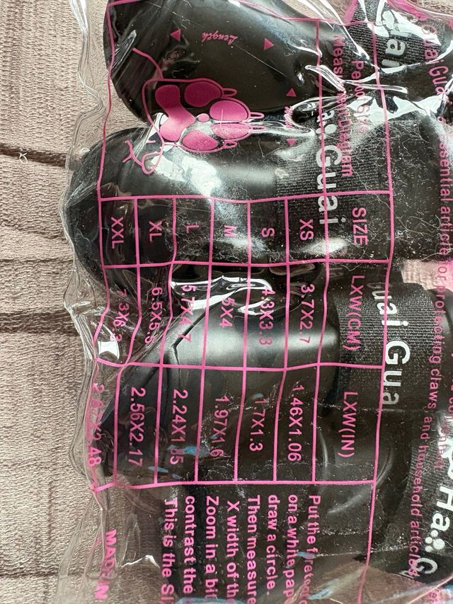 4 paia di stivali per cani neri