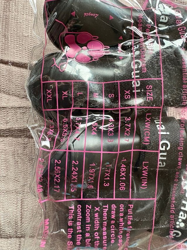 4 paia di stivali per cani neri