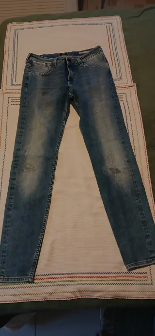 Pantalones vaqueros desgastados azul. Precio x mas