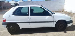 Citroen Saxo 2002, funda asientos y aceite
