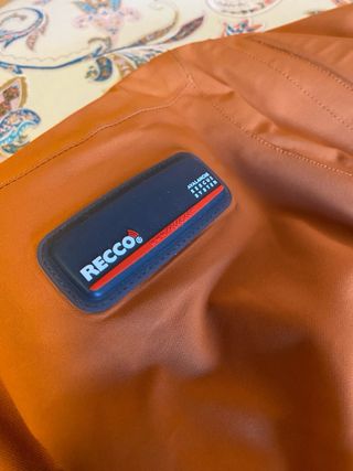 Chaqueta Quechua Naranja y Gris