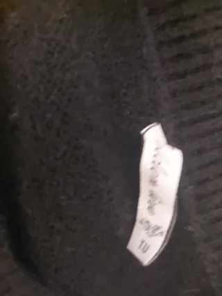 Maglia nera con decorazioni