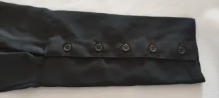 Blusa negra con lazada