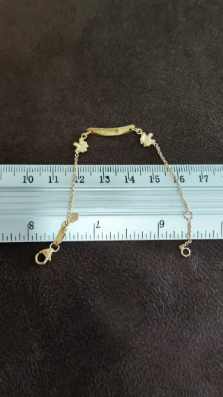 Pulsera bebé oro ley 18 kilates nueva