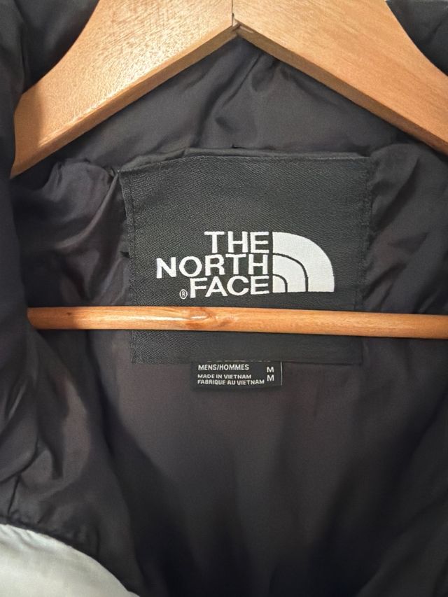 Chaqueta The North Face Plumas Negra y Blanca