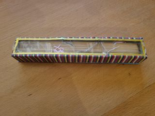 Ventaglio orientale in legno intagliato