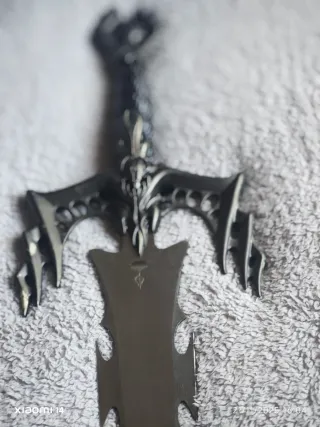 Espada decorativa grabada