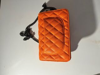 Borsa Chanel arancione in pelle granulata