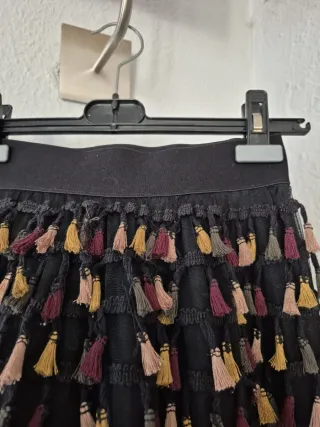 Falda larga con pompones ,la he lavado a mano