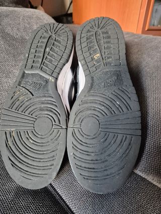 Nike Dunk Low Retro Cuero Negro Blanco.