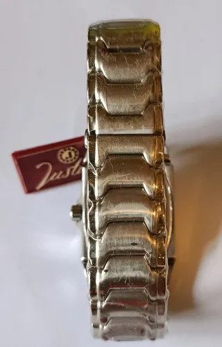 Reloj Justina Cuarzo Negro y Plateado. Nievo