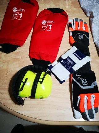 Manoplas anticorte y guantes Husqvarna
