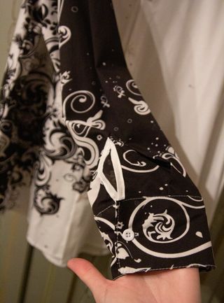 Camicia Tg M bianca e nera con disegni