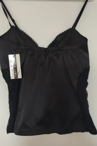 Corpiño negro con cremallera y pedrería