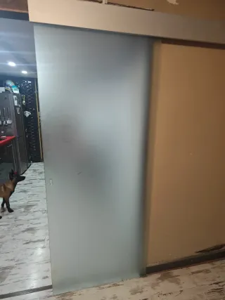 Puerta corredera de cristal