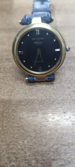 Orologio altanus vintage nero e oro vintage