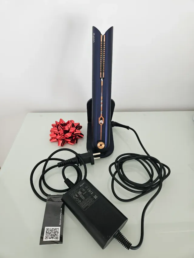 Plancha de pelo Dyson azul y dorado