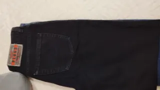 Pantalones vaqueros negros unisex con botones