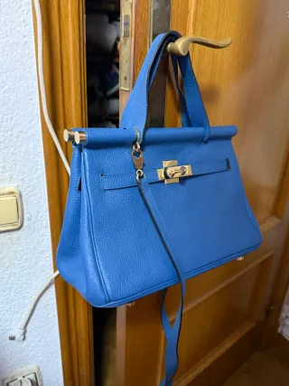 Bolso Hermès Azul con detalles dorados