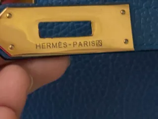 Bolso Hermès Azul con detalles dorados