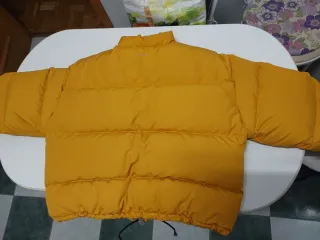 Plumas amarillo como nuevo