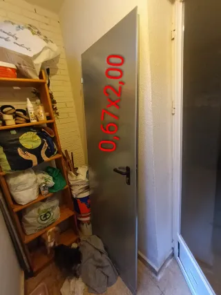 Puerta galvanizada 0,67x2,00 Negociable sin marco