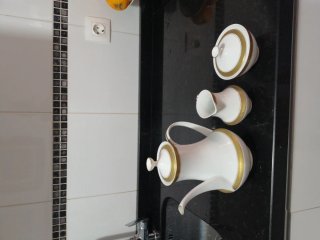 Juego de café de porcelana blanco y dorado