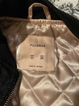 Cazadora bomber negra casi nueva