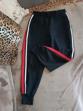 Pantaloni donna neri con righe rosse e bianche