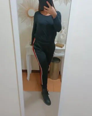 Pantaloni donna neri con righe rosse e bianche