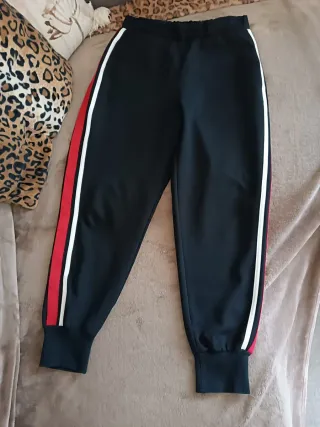 Pantaloni donna neri con righe rosse e bianche