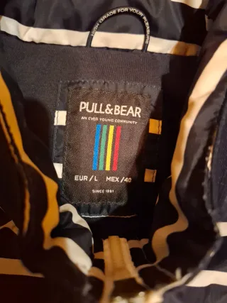 Chubasquero hombre rayas blanco y negro