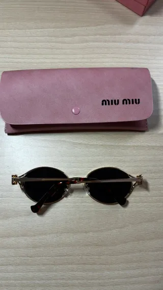 Gafas de sol Miu Miu redondas