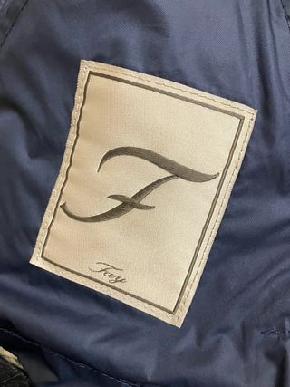 Giacca leggera blu con zip dorata