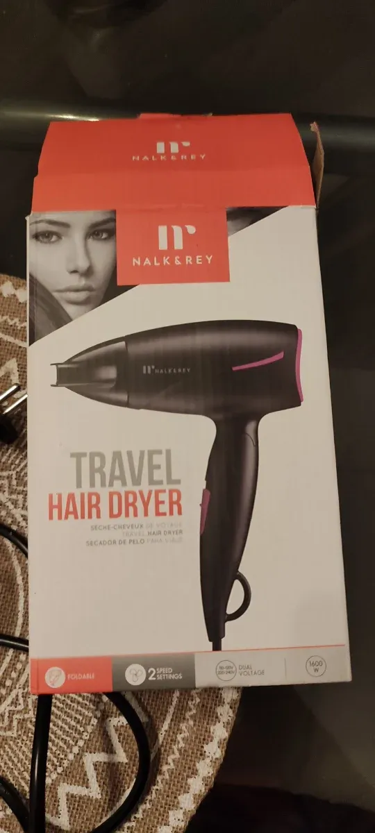 Secador de pelo negro y rosa