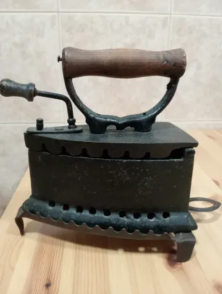 CincoPlanchas antiguas de hierro fundido.