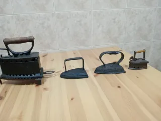 CincoPlanchas antiguas de hierro fundido.