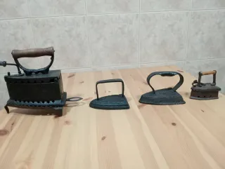 CincoPlanchas antiguas de hierro fundido.